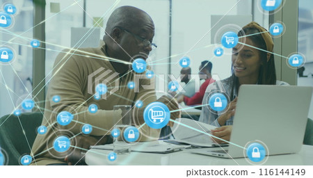 Image of icons connected with lines over diverse coworkers discussing reports on laptop Image of icons connected with lines over diverse coworkers discussing reports on laptop 116144149