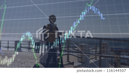 Image of financial graph, and data over aftican american woman with scooter at sea Image of financial graph, and data over aftican american woman with scooter at sea 116144507