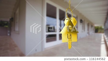Image of golden key with house shape over house Image of golden key with house shape over house 116144562