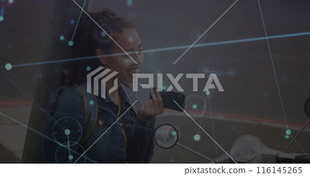 Image of network of connections with data over biracial woman using smartphone 116145265