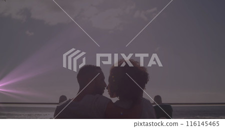 Image of light spots over diverse couple kissing 116145465