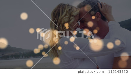 Image of spots over caucasian couple embracing Image of spots over caucasian couple embracing 116145550