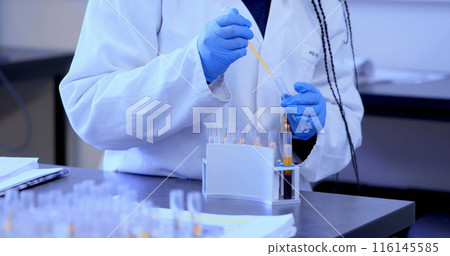 Image of shapes over african american female scientist in lab Image of shapes over african american female scientist in lab 116145585