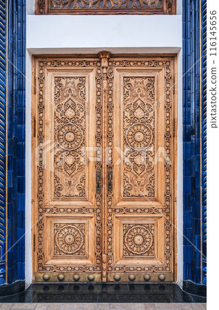 oriental Islamic pattern Uzbek traditional ornament on wooden carved door in Museum of Political Repression in Tashkent oriental Islamic pattern Uzbek traditional ornament on wooden carved door in Museum of Political Repression in Tashkent 116145656