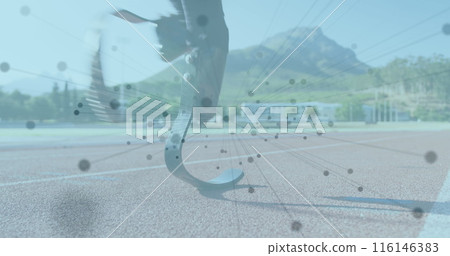 Image of network of connections over disabled male athlete with running blades on racing track 116146383