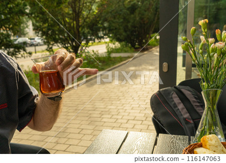 Turkish Tea on a Street Cafe Table, Arabic Cup in Restaurant, Black Tea Drinking in Turkish Cup 116147063