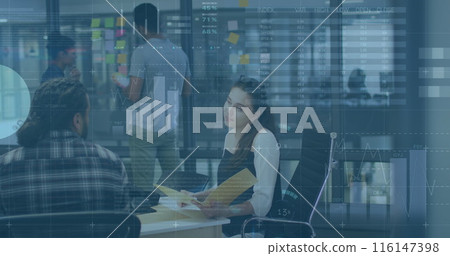 Image of infographic interface over diverse woman explaining reports to coworkers in office 116147398