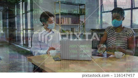 Image of trading board, diverse coworkers wearing mask and using sanitizer and talking in office Image of trading board, diverse coworkers wearing mask and using sanitizer and talking in office 116147457