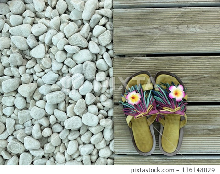 Stones, flip flops on wooden background. Flat lay. Summer holiday concept Stones, flip flops on wooden background. Flat lay. Summer holiday concept 116148029