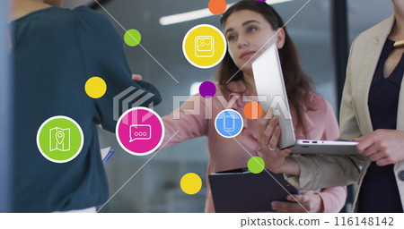 Image of social media icons and numbers over diverse business people Image of social media icons and numbers over diverse business people 116148142