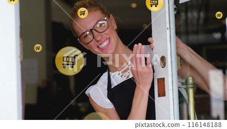 Image of shopping cart icons, caucasian female barista welcoming by standing and opening door 116148188
