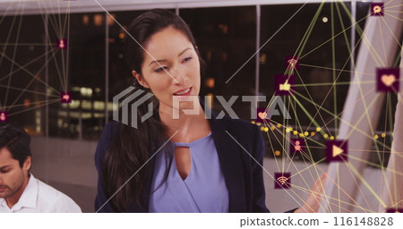 Image of network of connections with icons over business people 116148828