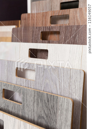Samples of laminate or parquet with a pattern and wood texture for flooring 116149057