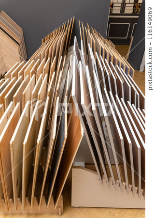 Samples of laminate or parquet with a pattern and wood texture for flooring 116149069