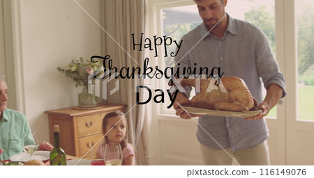 Image of happy thanksgiving day text over caucasian man holding turkey Image of happy thanksgiving day text over caucasian man holding turkey 116149076
