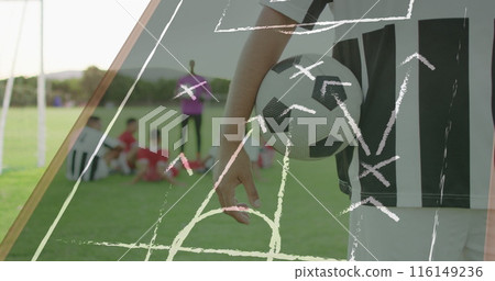Image of game plan over football player and ball Image of game plan over football player and ball 116149236