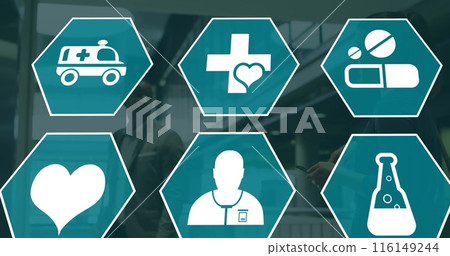 Image of medical icons over diverse business people in office Image of medical icons over diverse business people in office 116149244