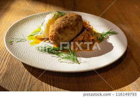 Breaded Meat Cutlets with Mashed Potatoes and Stewed Cabbage Garnish, Restaurant Main Course 116149793