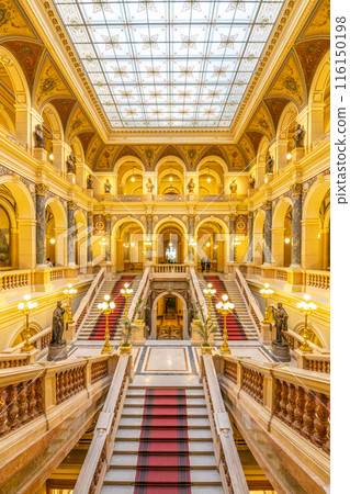 A massive building with numerous staircases leading to different levels within the National Museum Foyer in Prague, Czechia 116150198