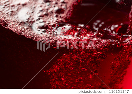 Red wine abstract splashing in glass. Red wine abstract splashing in glass. 116151347