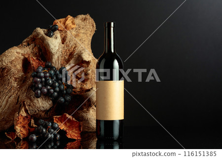 Bottle of red wine with empty label. Bottle of red wine with empty label. 116151385