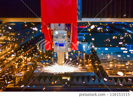 Industrial laser cut machine while cutting the sheet metal with the sparking light. 116151515