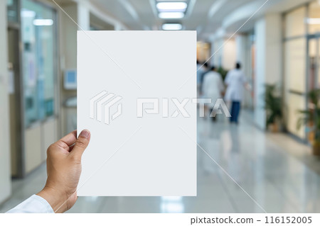 Mock-Up promotion poster displayed on the front of bright blur medical clinic, hospital interior background with defocused effect. Blank A4 white paper on abstract defocused luxury office corridor. Ad 116152005