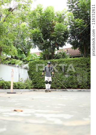 Man playing skateboard 116152611