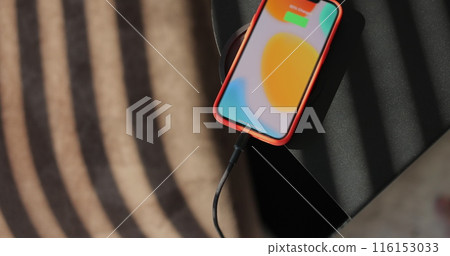 Close-up of the charging connection to smartphone. Phone charging port. Mobile smartphones charging. 116153033