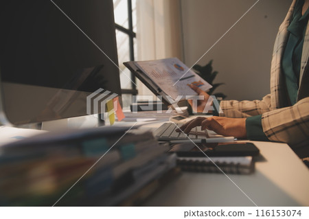 Team of business people working together in the meeting room office, teamwork background charts and graphs banner, double exposure successful teamwork,business planning concept. Team of business people working together in the meeting room office, teamwork background charts and graphs banner, double exposure successful teamwork,business planning concept. 116153074