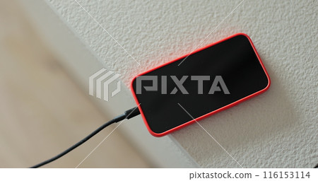 Close-up of the charging connection to smartphone. Phone charging port. Mobile smartphones charging. Close-up of the charging connection to smartphone. Phone charging port. Mobile smartphones charging. 116153114