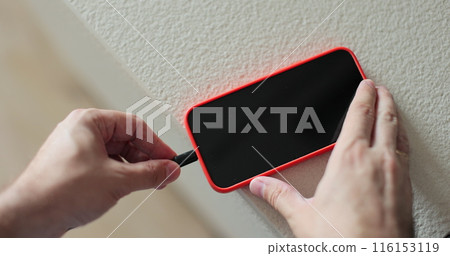Close-up of the charging connection to smartphone. Phone charging port. Mobile smartphones charging. 116153119