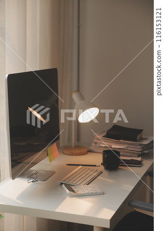messy office workspace. Messy and cluttered office desk. Messy business office with piles of files and disorganized clutter. messy office workspace. Messy and cluttered office desk. Messy business office with piles of files and disorganized clutter. 116153121