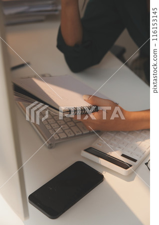 Brainstorming meeting of businessmen working together to come up with a marketing strategy Business finance and accounting concepts 116153145