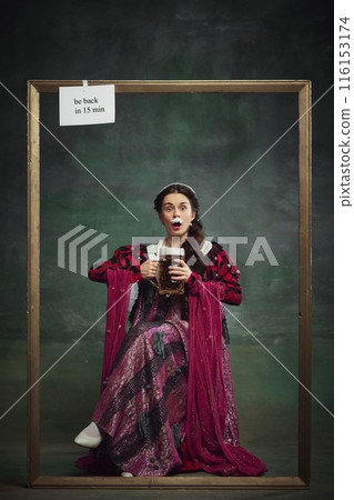 Advertisements for themed bars and restaurants. Elegant young woman in richy dress sitting and drinking foamy lager beer on vintage green background. Advertisements for themed bars and restaurants. Elegant young woman in richy dress sitting and drinking foamy lager beer on vintage green background. 116153174