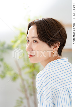 Smiling woman profile Smiling woman profile 116153399