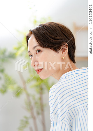 Smiling woman profile Smiling woman profile 116153401