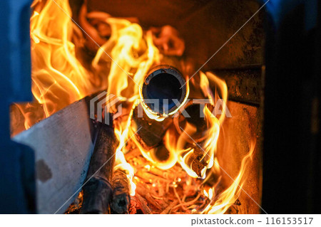 Flame of wood stove 116153517