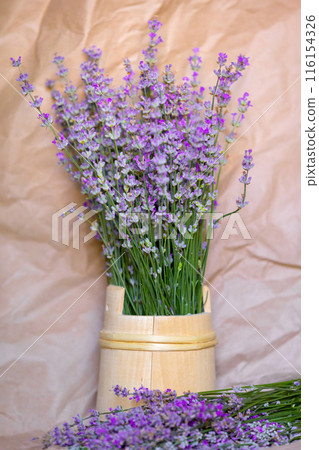 Wooden bowl with lavender flowers Wooden bowl with lavender flowers 116154326