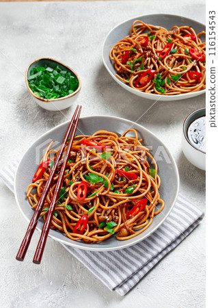 udon noodles, with shimeji mushrooms, vegetables, in sauce, with sesame seeds, green onions, Asian vegetarian food, horizontal, without people, 116154543