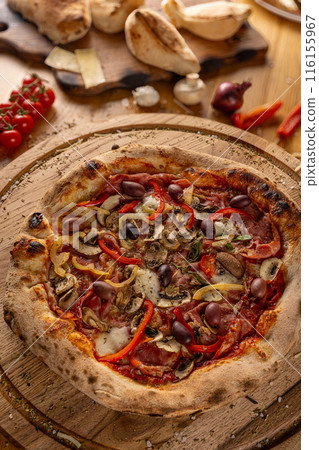Flame grilled Italian pizza 116155967