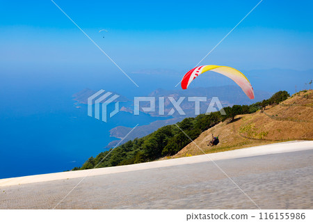 Flying paraglider at Babadag mountain in Turkey 116155986