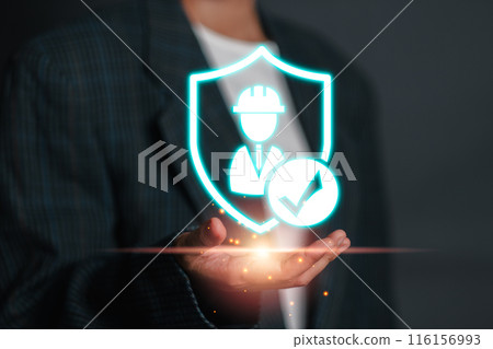 Illustration of work safety concept featuring a glowing shield with a worker icon and checkmark, emphasizing occupational health and safety. 116156993