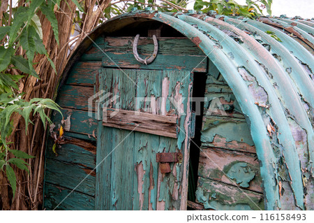 Old Disused Wartime Nissen Hut in an Urban Garden 116158493