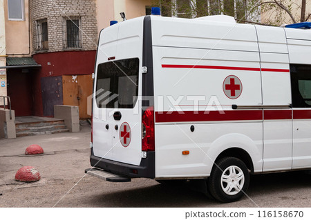 Ambulance at the entrance of the house 116158670