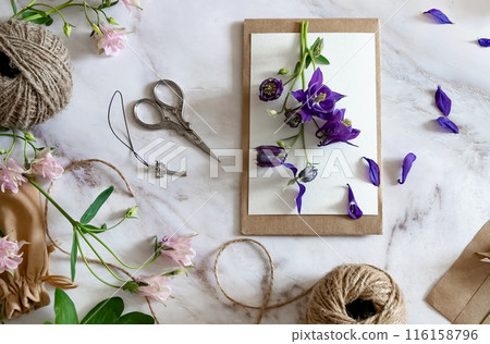 Florist makes a bouquet.a woman makes a bouquet of peonies, a bouquet of kraft paper., pruning flowers, stylite makes a bouquet Florist makes a bouquet.a woman makes a bouquet of peonies, a bouquet of kraft paper., pruning flowers, stylite makes a bouquet 116158796