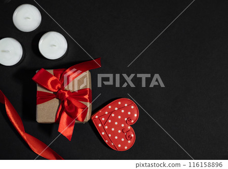 Valentine's Day. International Women's Day. Mothers day. Red hearts and craft gifts on a white wooden background. Copy space. Valentine's Day. International Women's Day. Mothers day. Red hearts and craft gifts on a white wooden background. Copy space. 116158896
