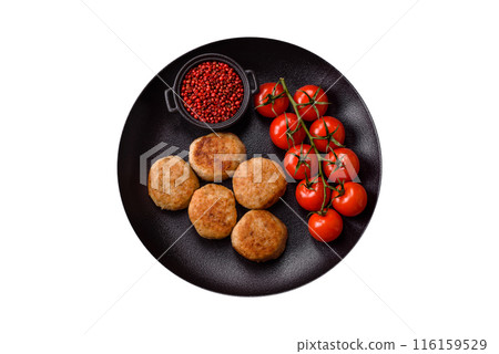 Delicious fresh fried minced fish cutlets with spices and herbs Delicious fresh fried minced fish cutlets with spices and herbs 116159529