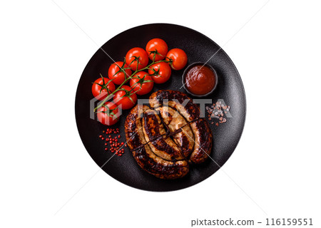 Delicious grilled sausage in the form of a ring with salt, spices Delicious grilled sausage in the form of a ring with salt, spices 116159551