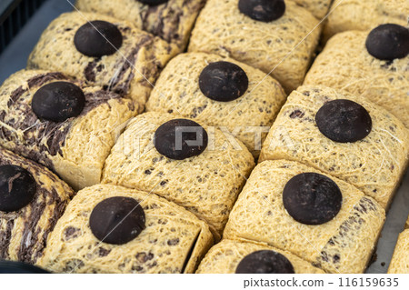 Chocolate halva squares, brown halawa also known as halawa, alva, haleweh, halava, helava, helva, aluva 116159635